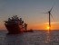 Ship and turbine at sunset